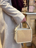 Leren handtas met gevlochten raffia